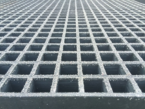 dark grey open mesh GRP panel.38mm x 38mm gritted